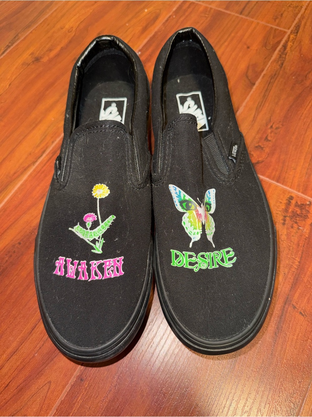Vans Black Slip-On Sneakers with Pink & Green Floral and Butterfly Graphics